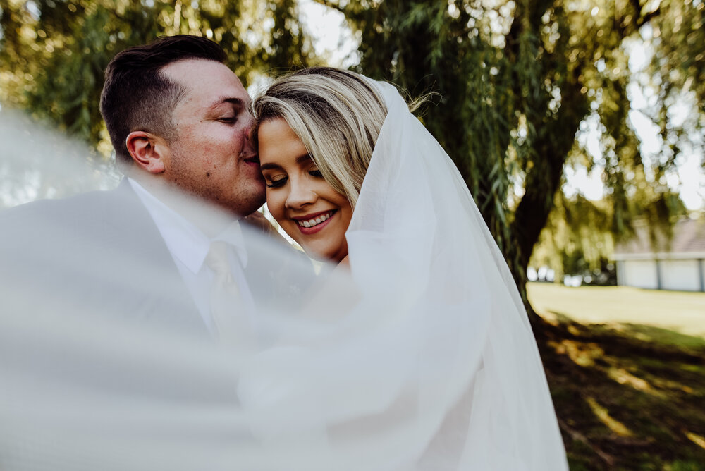 Mindy is so talented and kind and a dream to work with. She shot both our engagement and wedding photos and they all came out stunning. I couldn't recommend her enough! - Emily + Dusten