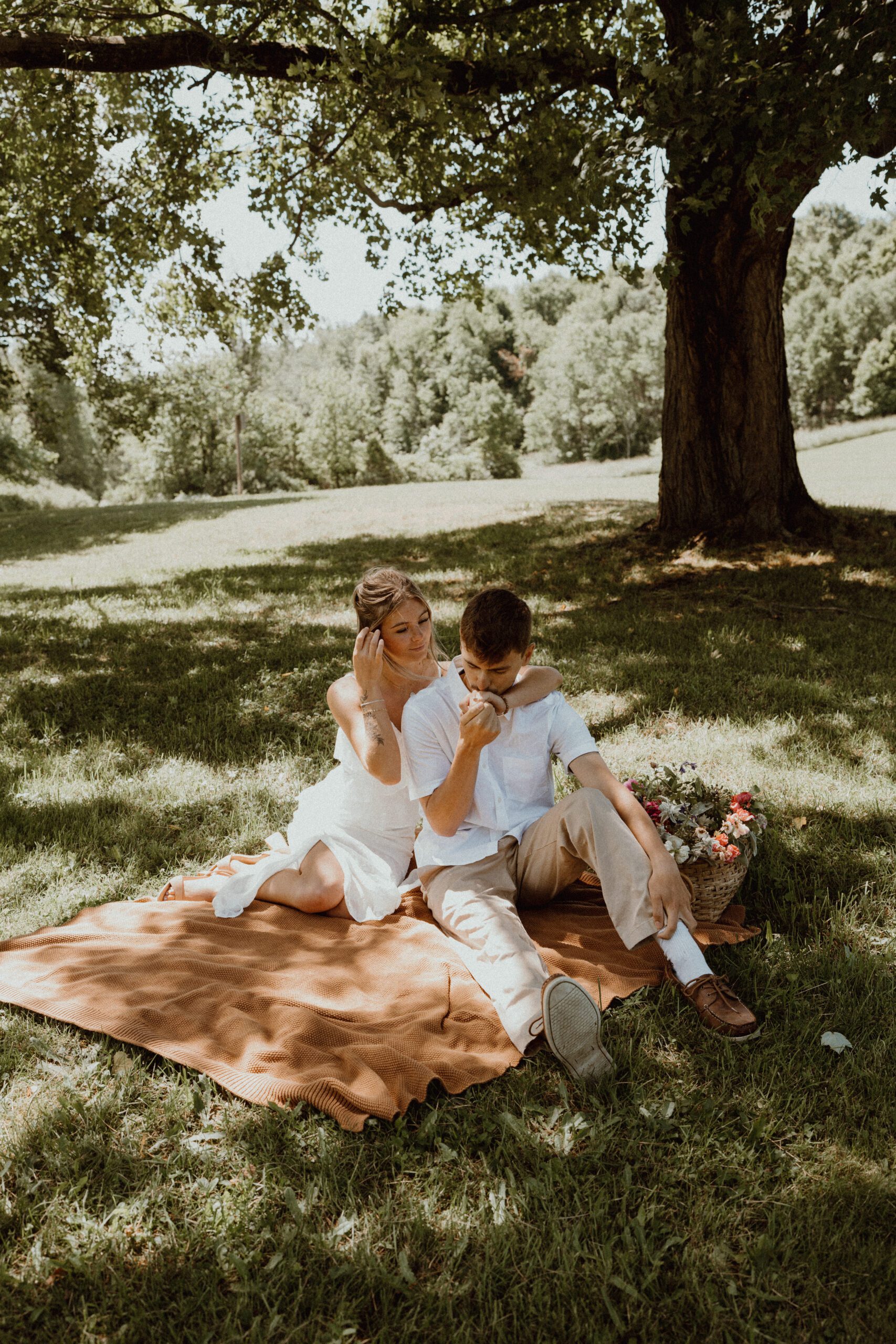 Liz and Nick’s engagement session at Fall Brook in Oswego, NY featured rustic barn charm, a romantic creek, and dreamy farmhouse vibes—perfectly capturing their love in an intimate countryside setting.
